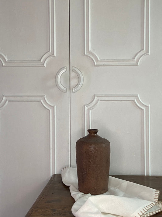 Bouteille en grès joufflue