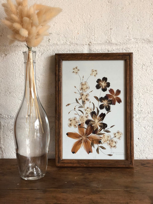 Cadre vintage avec plumes